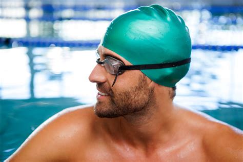 Does Your Hair Get Wet in a Swim Cap? And Why Do Fish Never Wear Them?